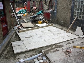 New concrete flooring outside the Den