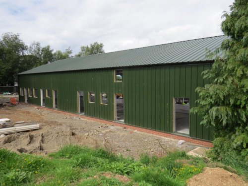 The rear side, facing the railway, is more complete